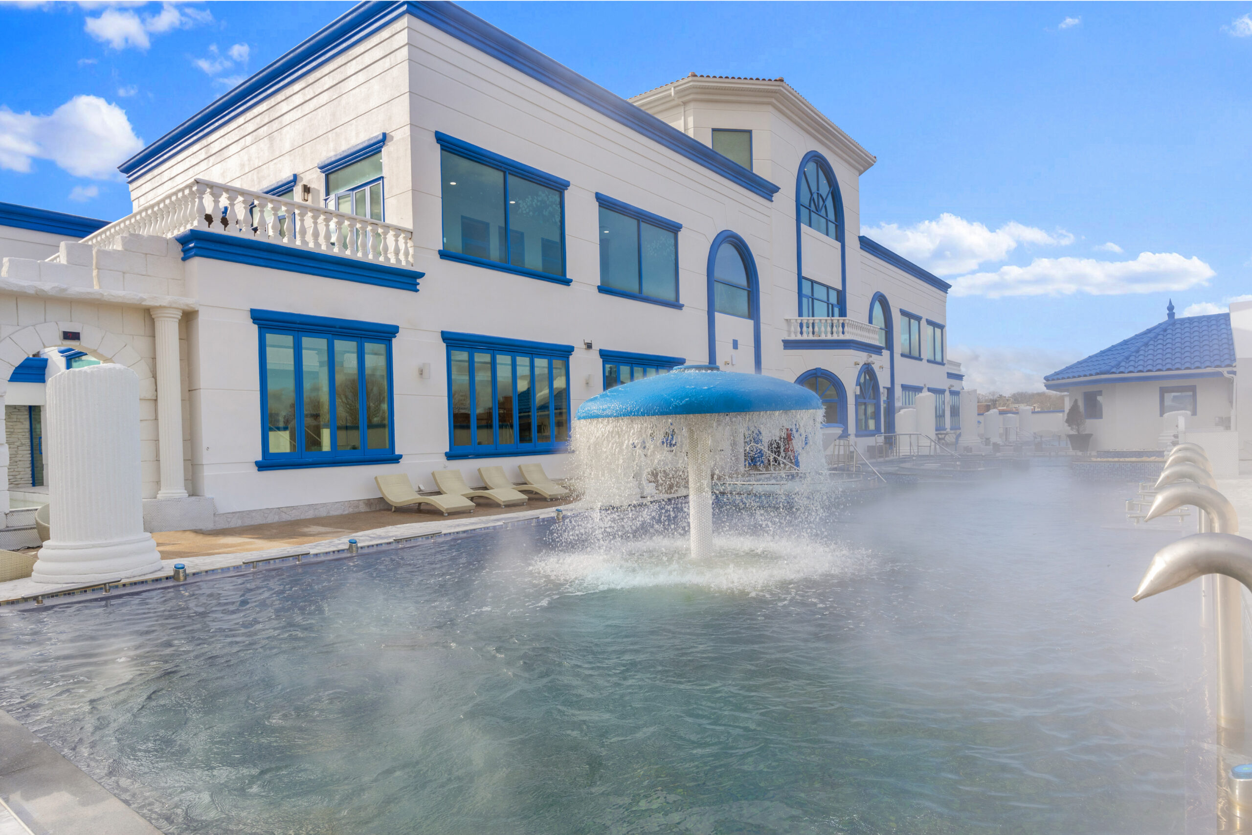 outdoor pool side area, showing Spa Castle building after renovation