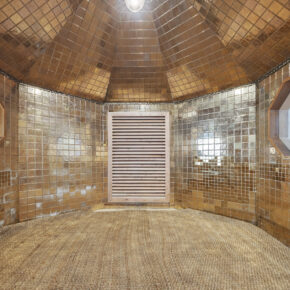 inside gold sauna room.