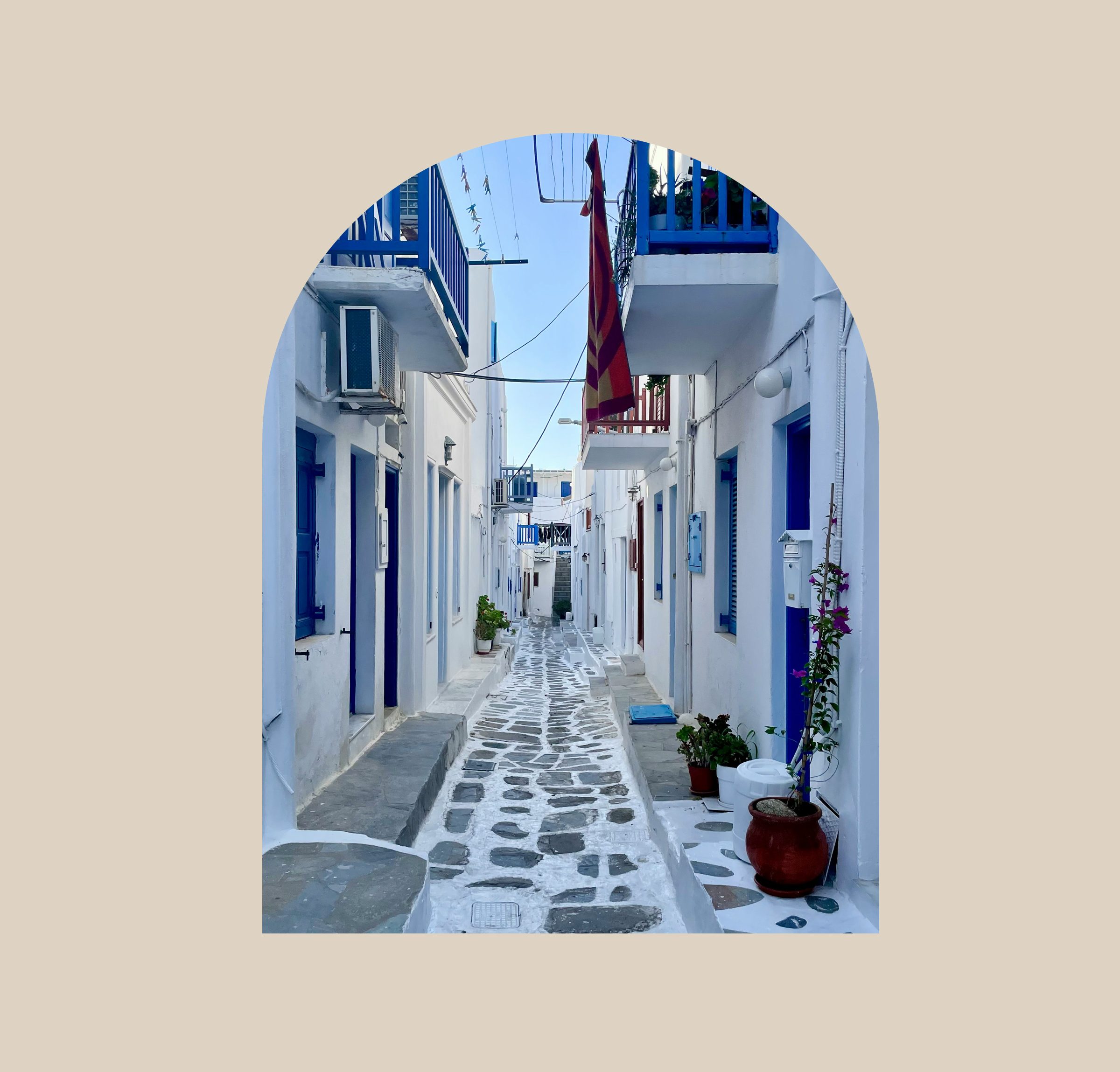 Blue and white houses in a Greek alley