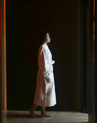 Women entering a heated sauna.